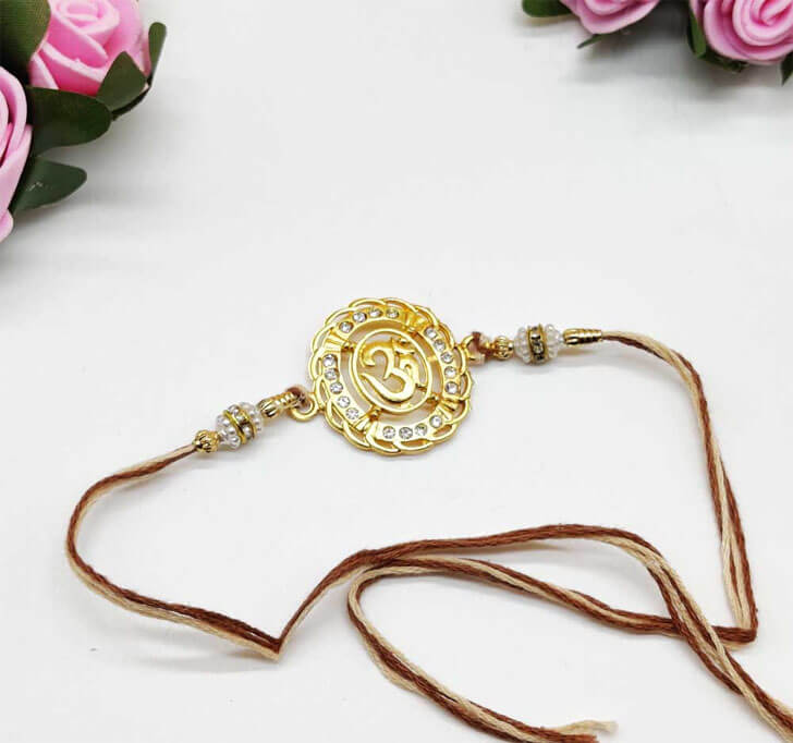 Designer OM Diamond Stone Center Piece Bhaiya Rakhi