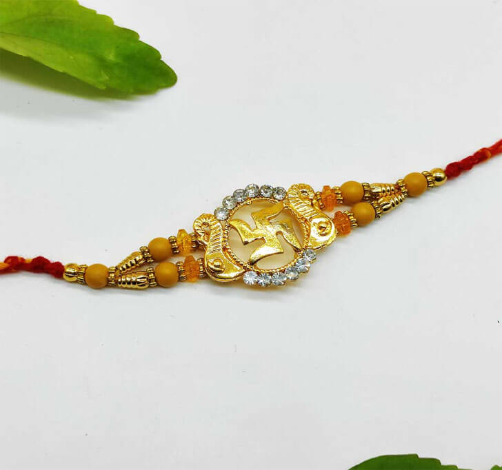 Buy Swastik Golden Center Piece Bhaiya Rakhi