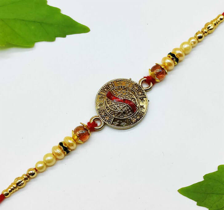 Golden Traditional Center Piece Bhaiya Rakhi