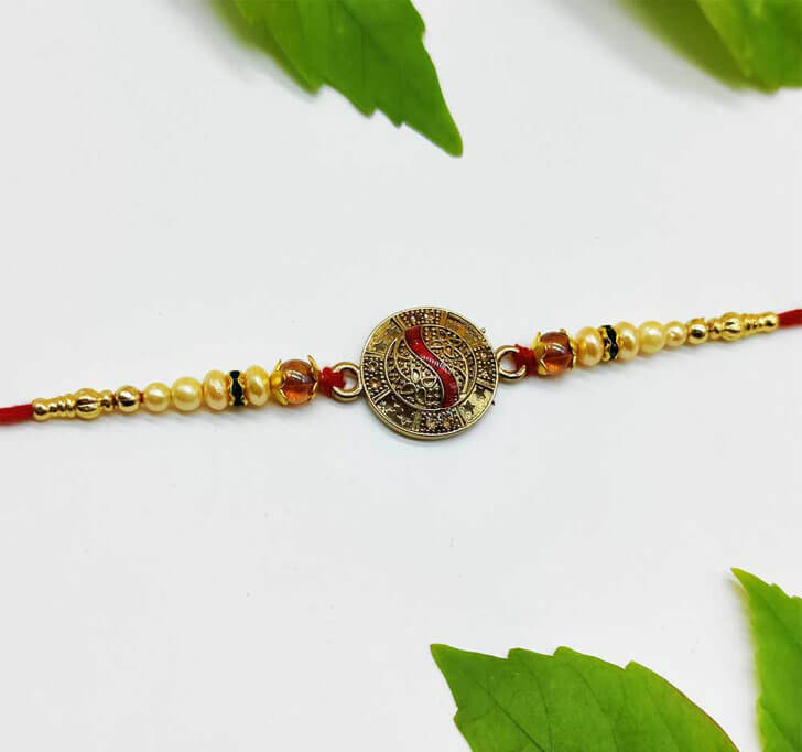 Buy Golden Traditional Center Piece Bhaiya Rakhi