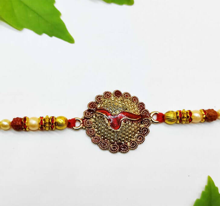 Traditional Designer Golden Center Piece Bhaiya Rakhi