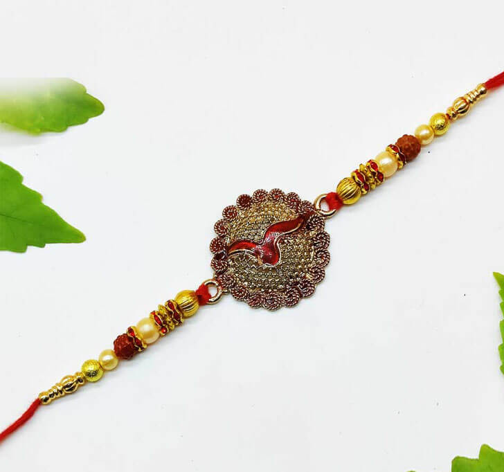 Buy Traditional Designer Golden Center Piece Bhaiya Rakhi