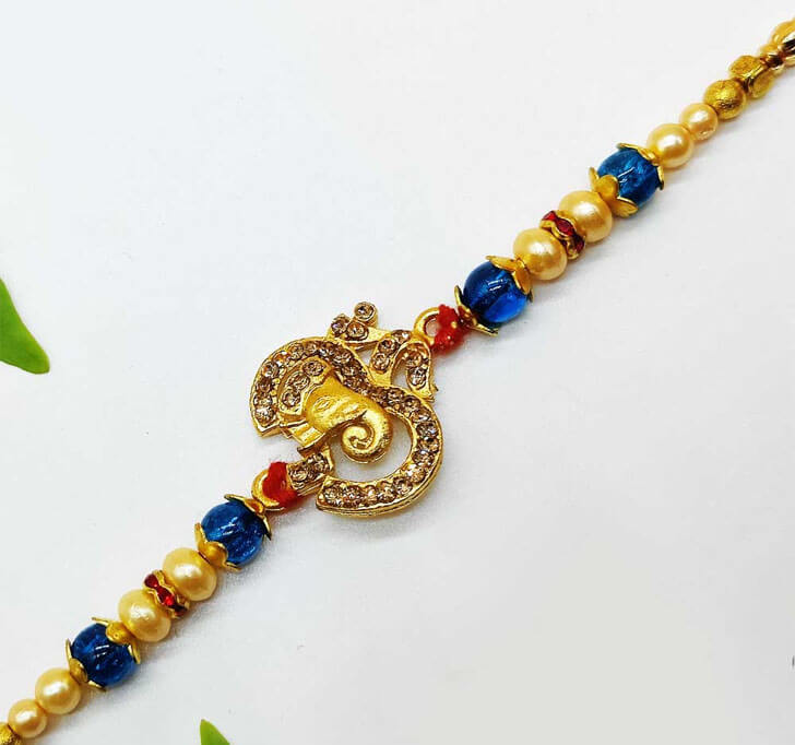 Elephant OM Golden Designer Center Piece Bhaiya Rakhi