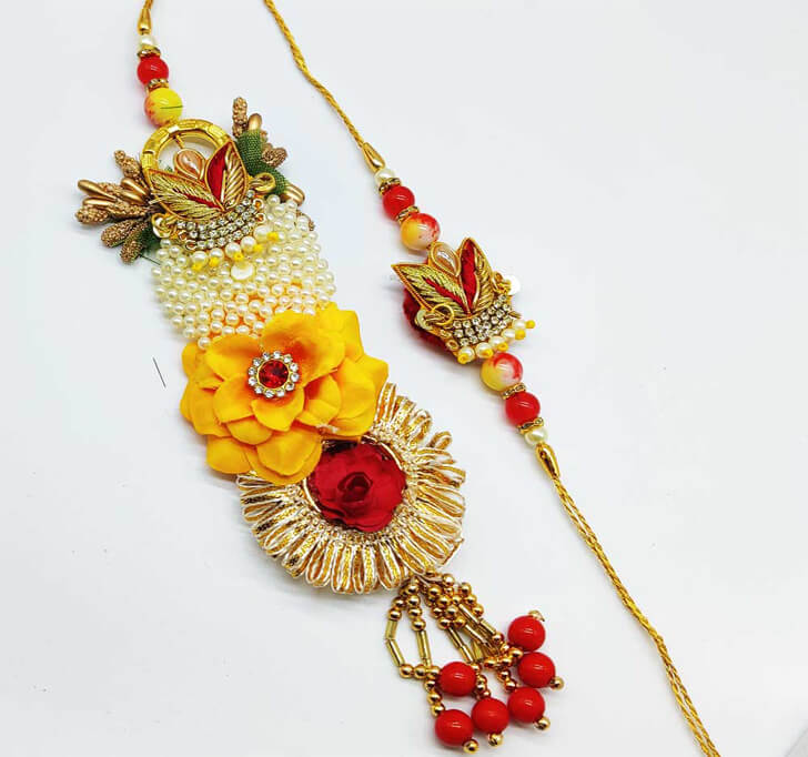 Buy Cream Artificial Designer Beads Paired Rakhi