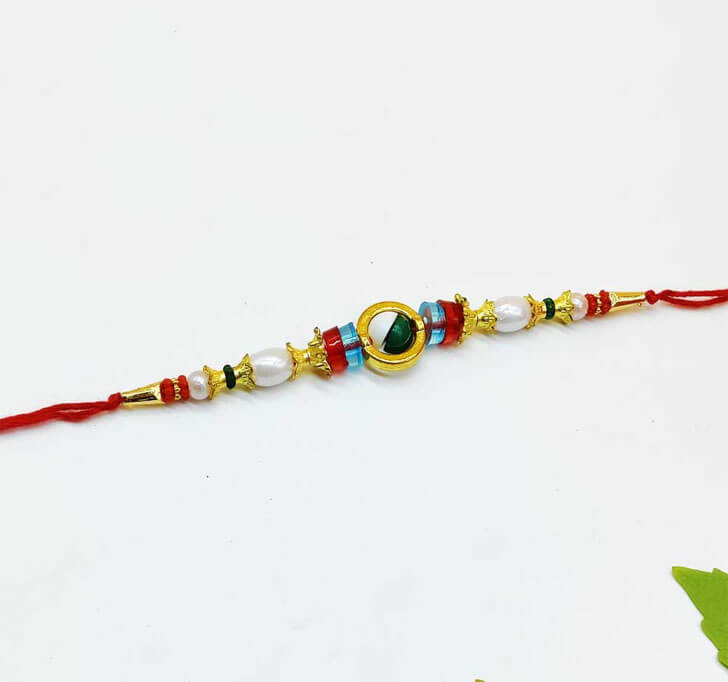 Attractive Golden Center Piece Bhaiya Rakhi