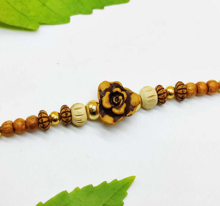 Buy Wooden Beads Center Piece Bhaiya Rakhi