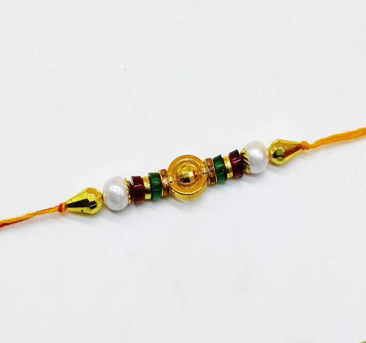 Designer Golden Center Piece Bhaiya Rakhi