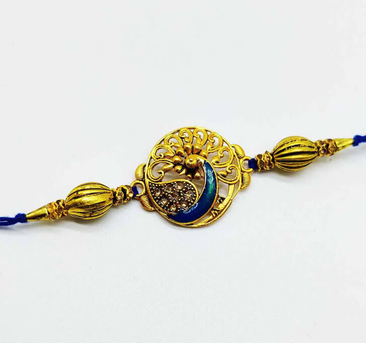 Buy Golden Peacock Center Piece Bhaiya Rakhi