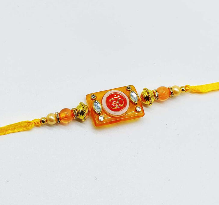 Buy OM Attractive Center Piece Bhaiya Rakhi